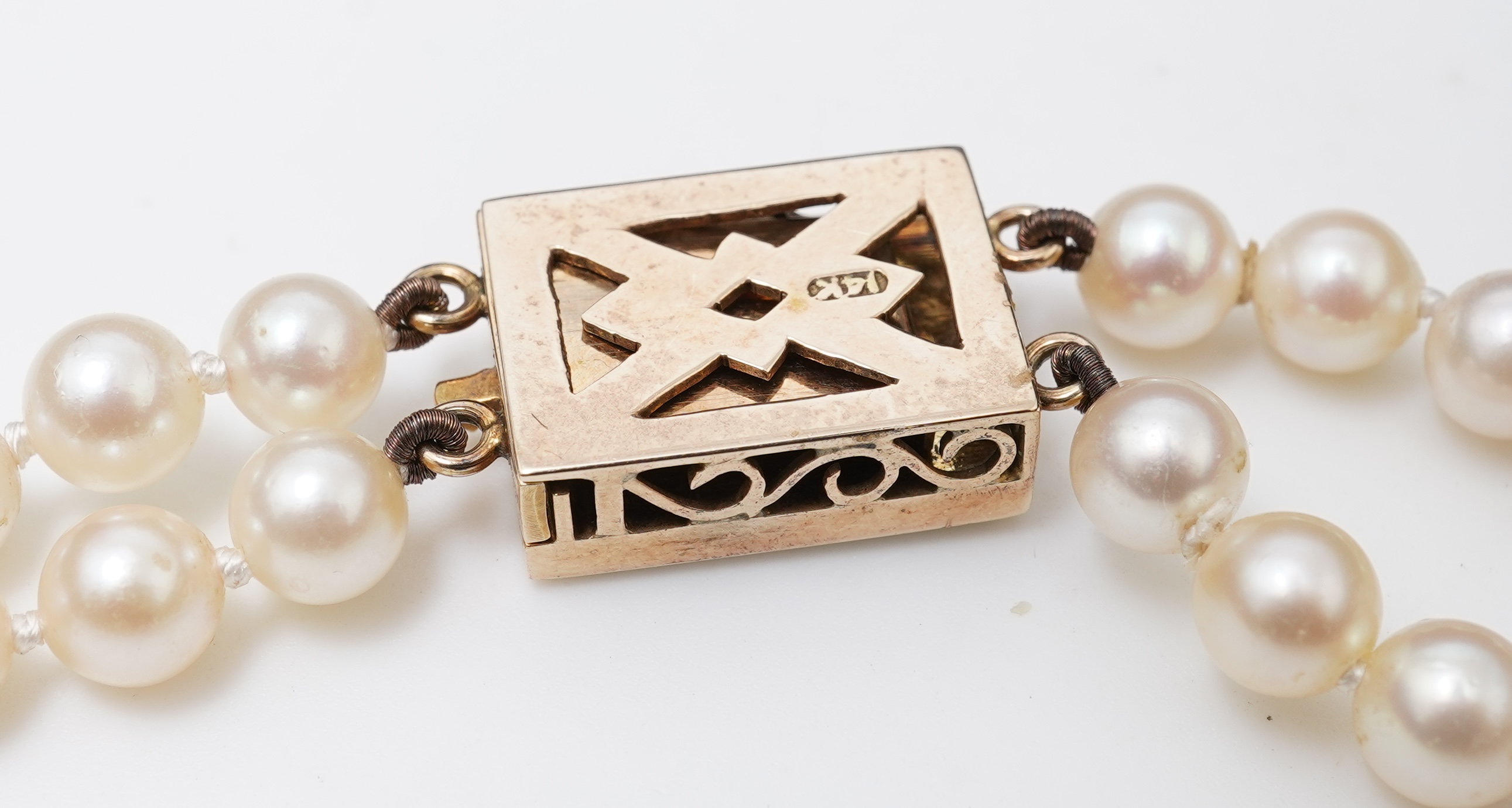 A cultured pearl and ruby necklace